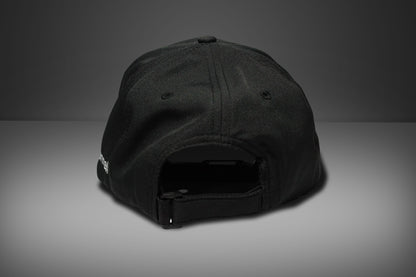 Black cap on a gray background