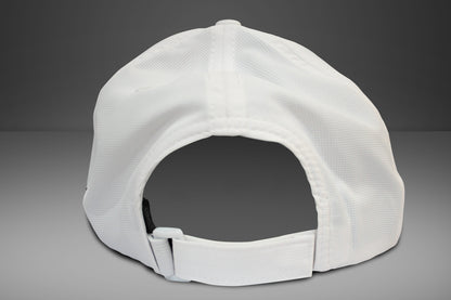 White baseball cap on a gray background with konnek sports logo